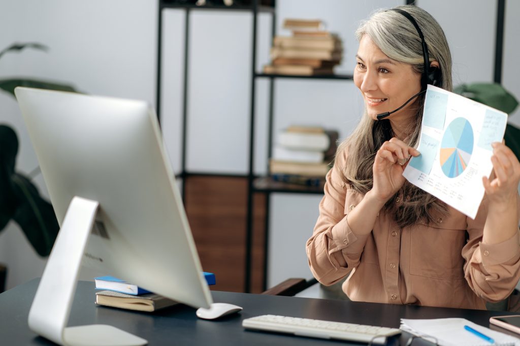 woman teaching through computer