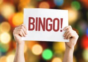 Depositphotos_85665284_L The word BINGO being held up on a card