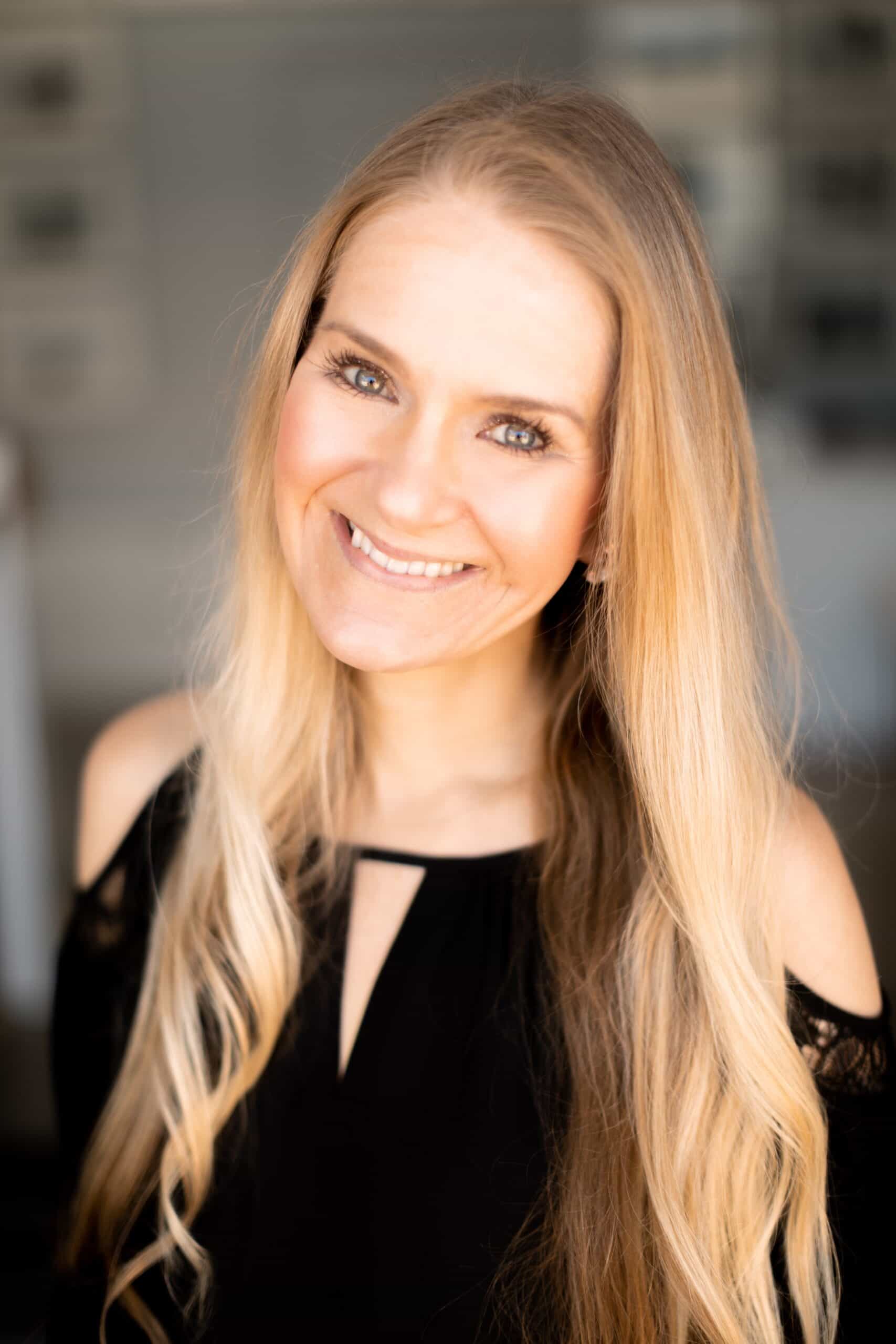 Christiane Schroeter Christine Schroeter headshot showing her with long blonde hair smiling for the camera.
